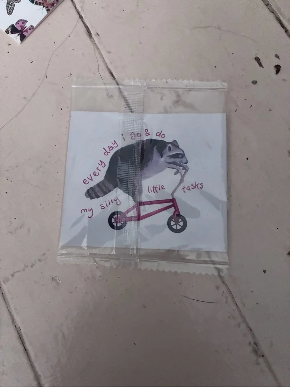 Raccoon on Bike Sticker